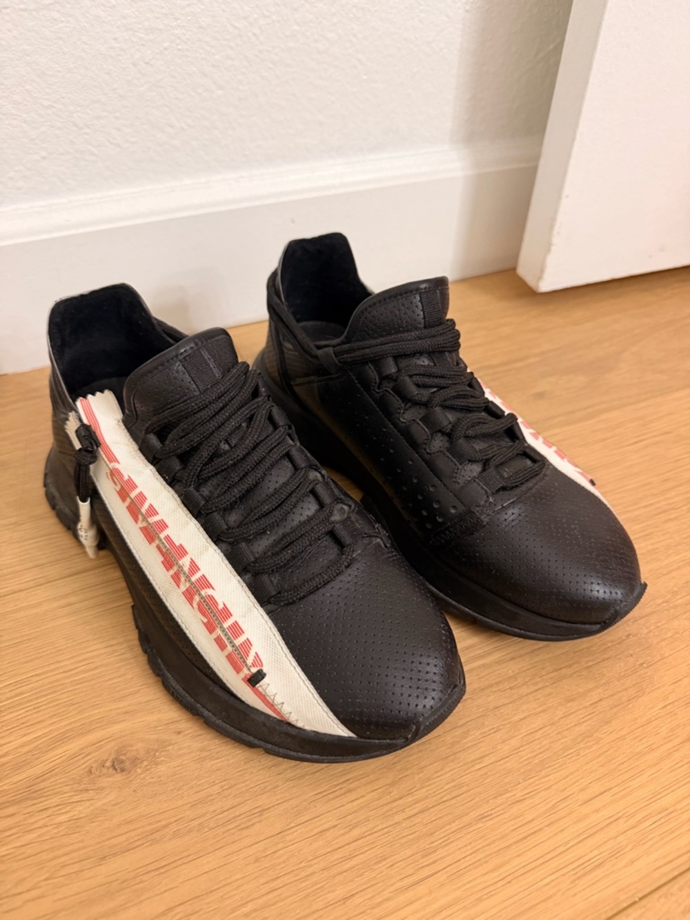 Givenchy Spectre Runner Black and White Low-Top Sneakers with Red Logo Accent